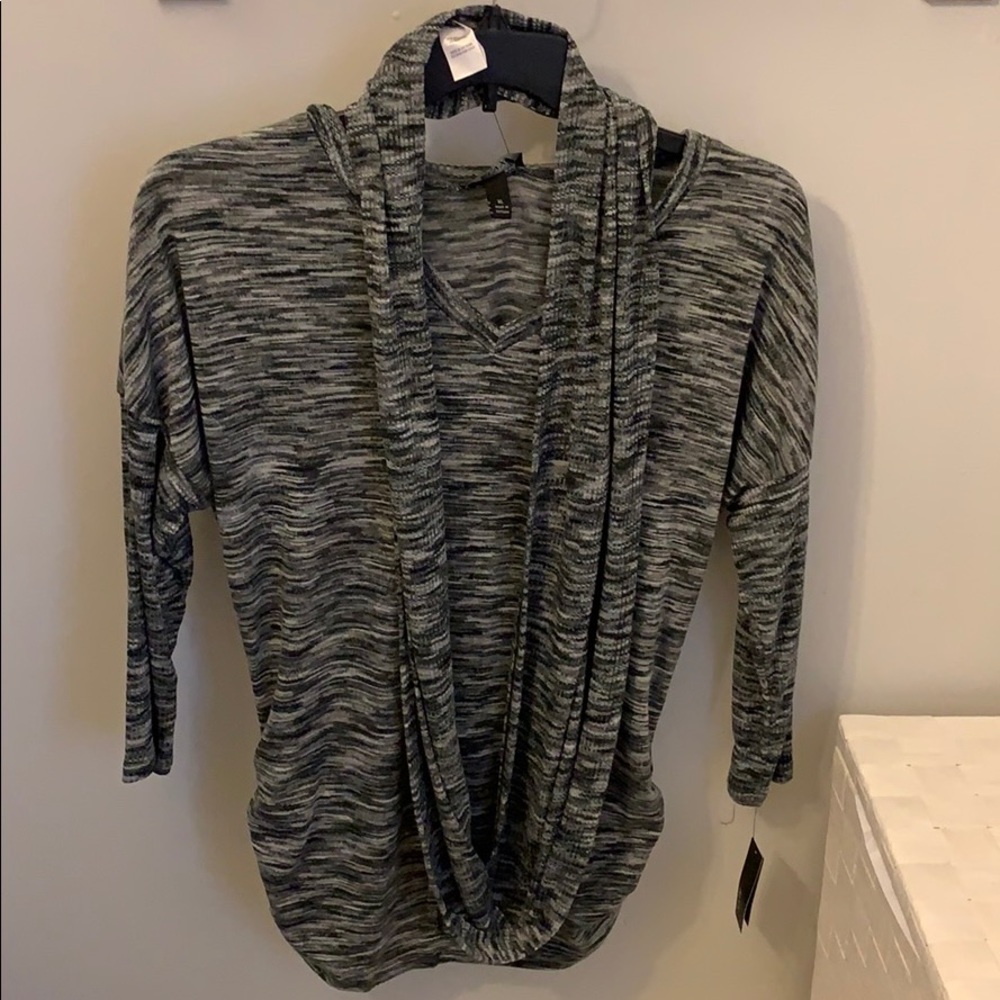 Grey blouse with scarf.